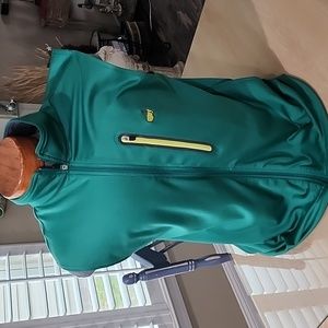 Masters sleeveless golf vest with 2 side pockets and one pocket on left chest